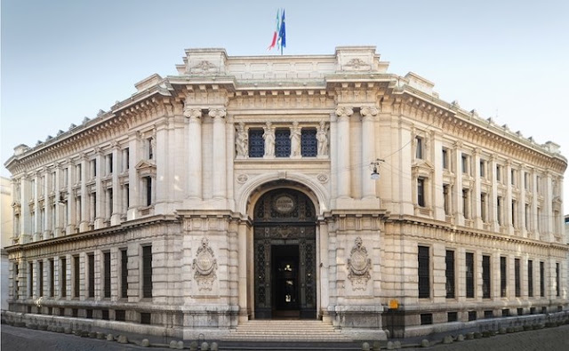 Italy eyes tighter terms in bad loan scheme extension